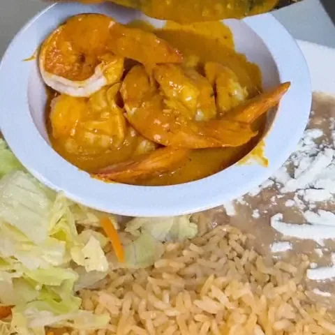 Lunch special plate of camarones a la diabla with rice, beans and salad at Camacho's Restaurant